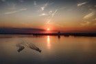 Speedboats during sunset