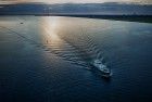 Motor boat cruising over lake Gooimeer