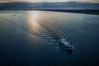 Motor boat cruising over lake Gooimeer