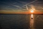 Sailing boat silhouette during sunset
