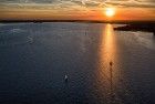 Sunset drone flight over lake Gooimeer