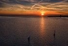 Sailing boats on Gooimeer during sunset