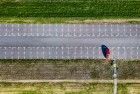 Top-down drone picture of an almost empty parking lot