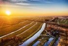 Sunset drone picture of fields near Weesp