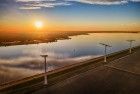 Sunset drone picture of windmills on Eemmeerdijk