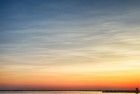 Sailing boats on lake Gooimeer during sunset