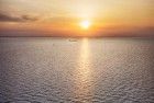 Sailing on lake Markermeer during sunset