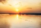 Sailing on lake Gooimeer during sunset