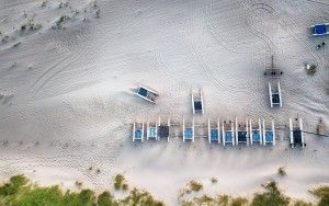 Boats on the beach during sunset