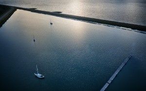 Boats at Oostvaardersdiep during sunset