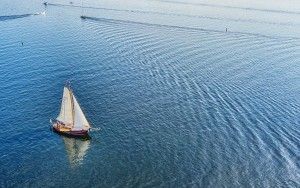 Sailing boat on lake Gooimeer