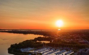 Sailing boats on lake Gooimeer during sunset