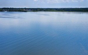 Drone picture of sailing boat on lake Gooimeer