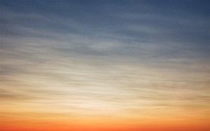 Sailing during sunset on lake Gooimeer