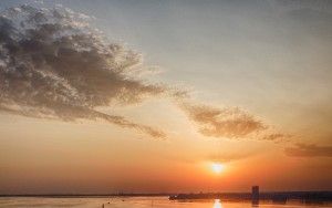 Boats on lake Gooimeer during sunset