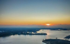 Drone sunset of camping Waterhout next to lake Noorderplassen