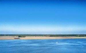 Sailing boats on lake Gooimeer