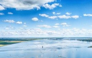 Boats on lake Gooimeer on a summer day