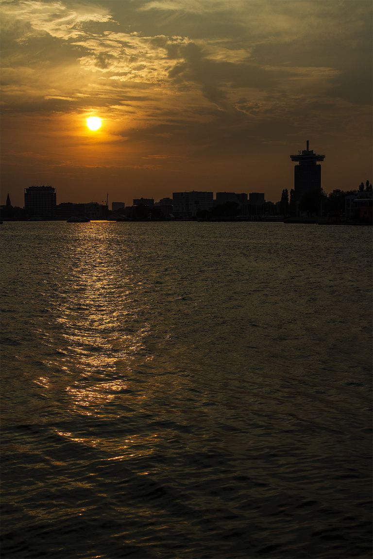 Sunset over the IJ river in Amsterdam