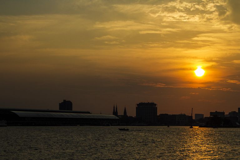 Sunset over the IJ river in Amsterdam