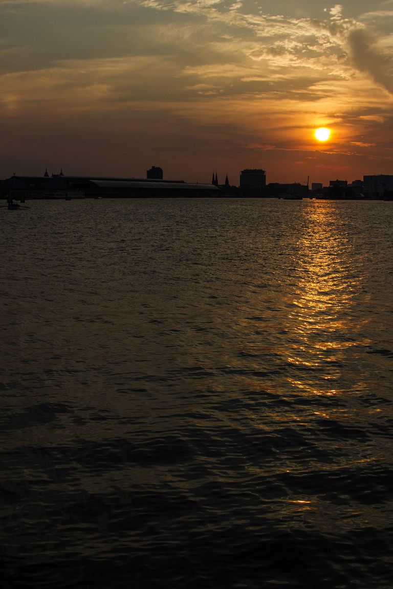 Sunset over the IJ river in Amsterdam