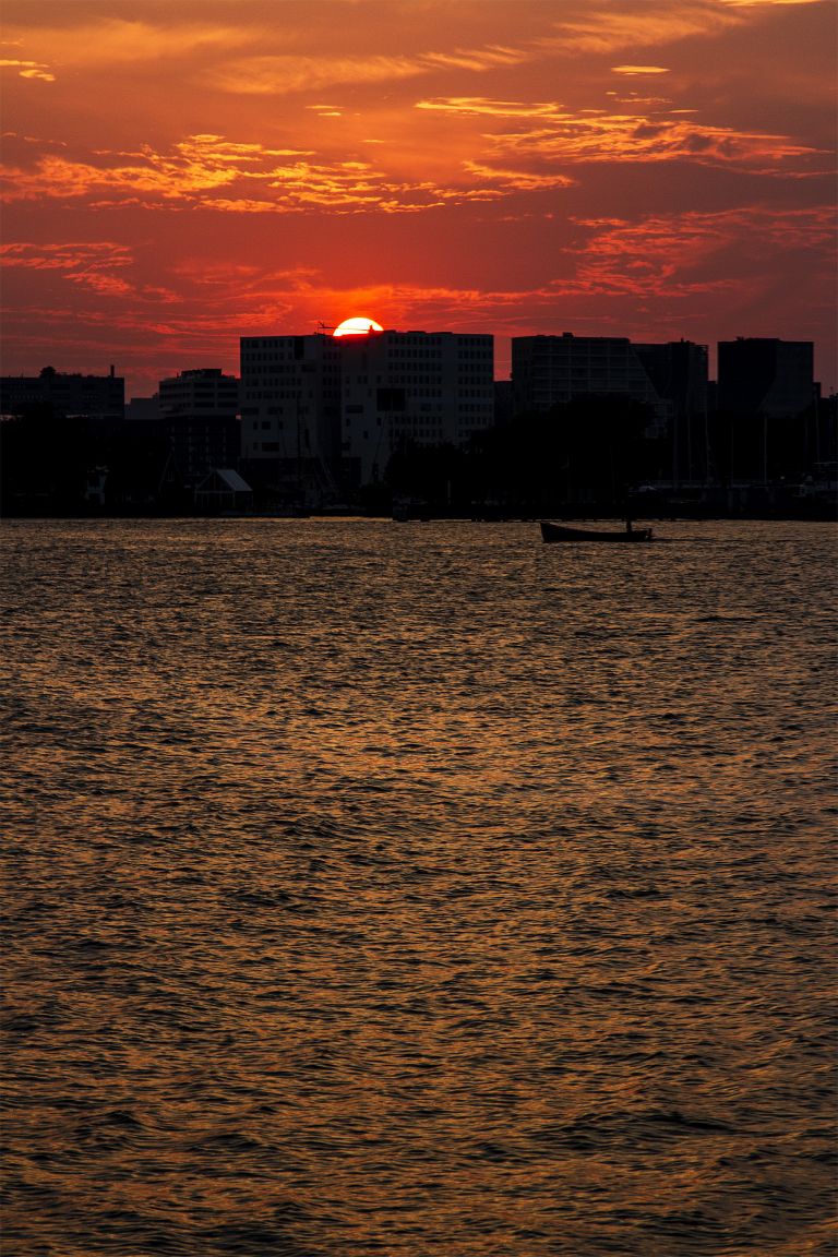 Sunset over the IJ river in Amsterdam