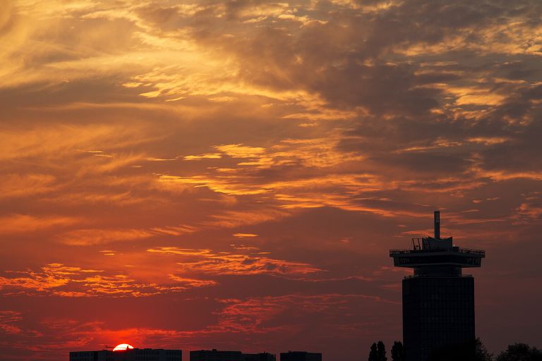 Sunset over the IJ river in Amsterdam