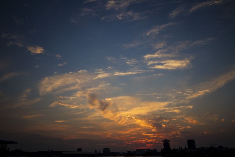 Sunset over the IJ river in Amsterdam