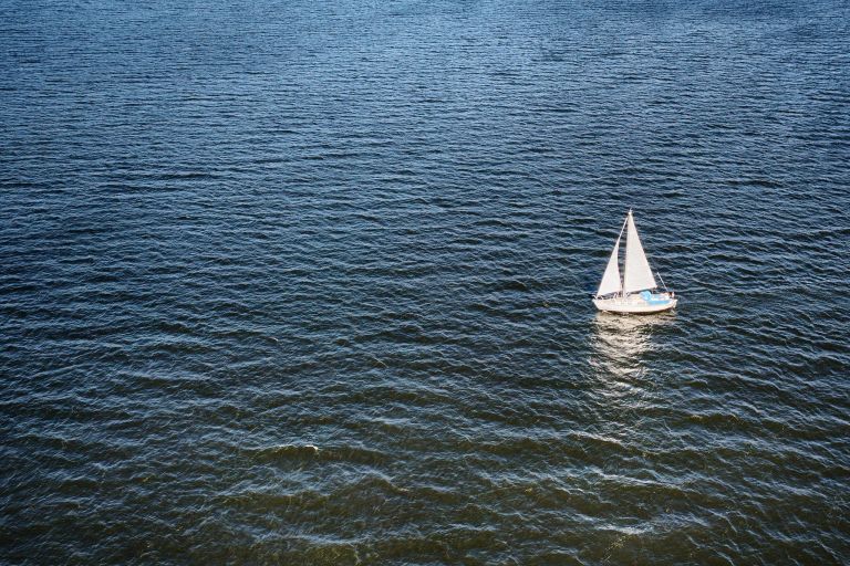 Lonely boat on lake Gooimeer