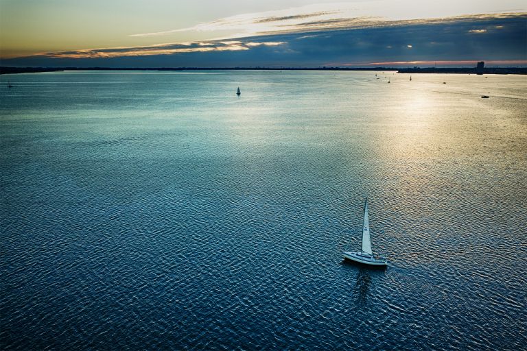 Sailing on lake Gooimeer during sunset