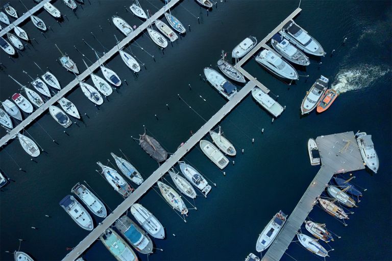 Marina of Huizen by drone during sunset