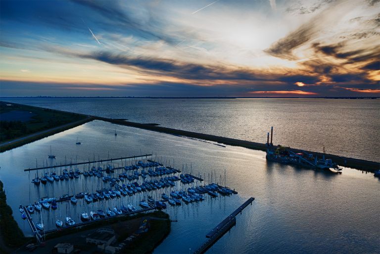 Oostvaardersdiep marina during sunset