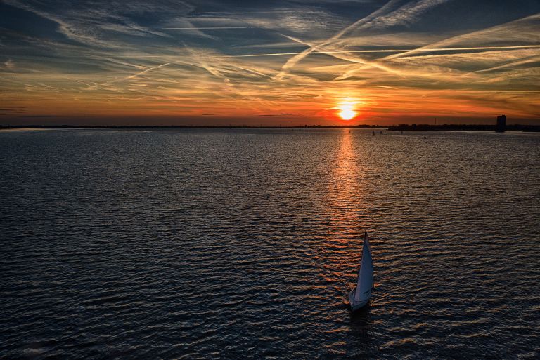 Sailing to the marina during sunset