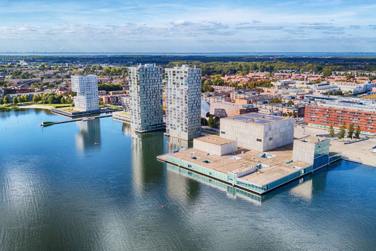 Almere city centre by drone next to lake Weerwater 