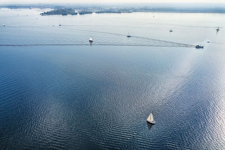 Sailing boats on lake Gooimeer