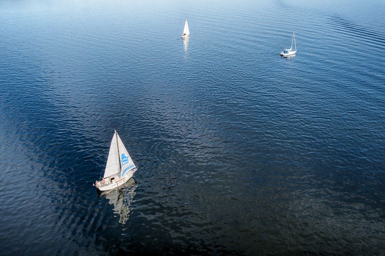 Drone picture of sailing boats on lake Gooimeer