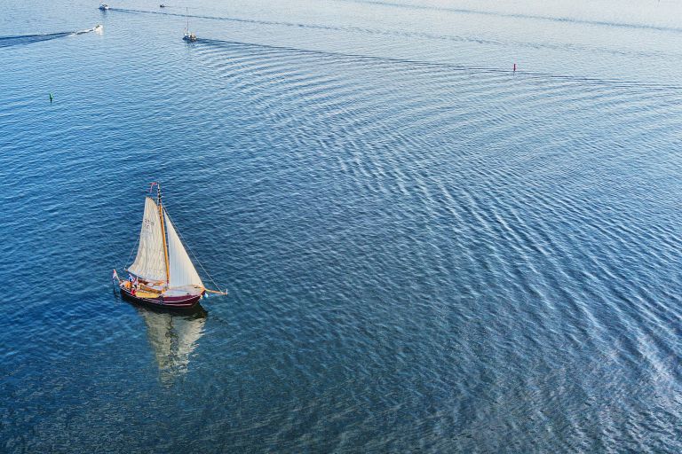 Sailing boat on lake Gooimeer