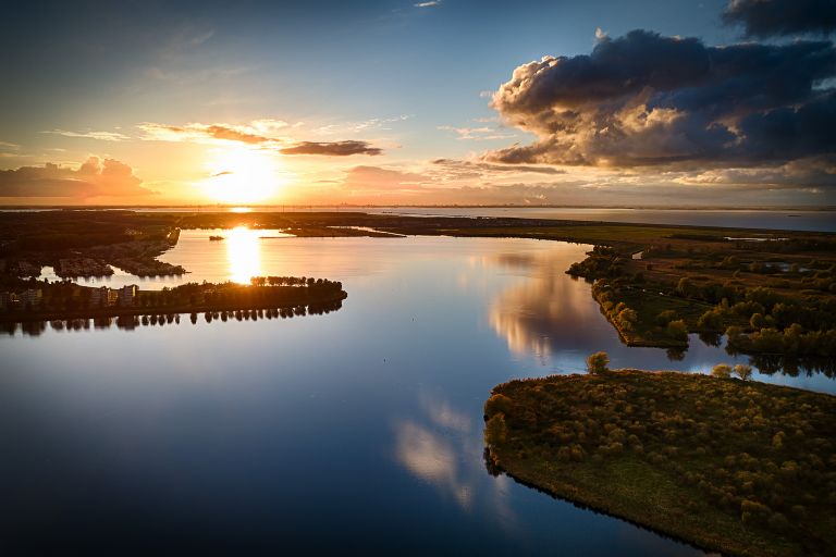 Drone sunset over lake Noorderplassen