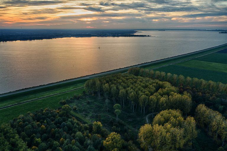 Sunset autumn picture of lake Gooimeer