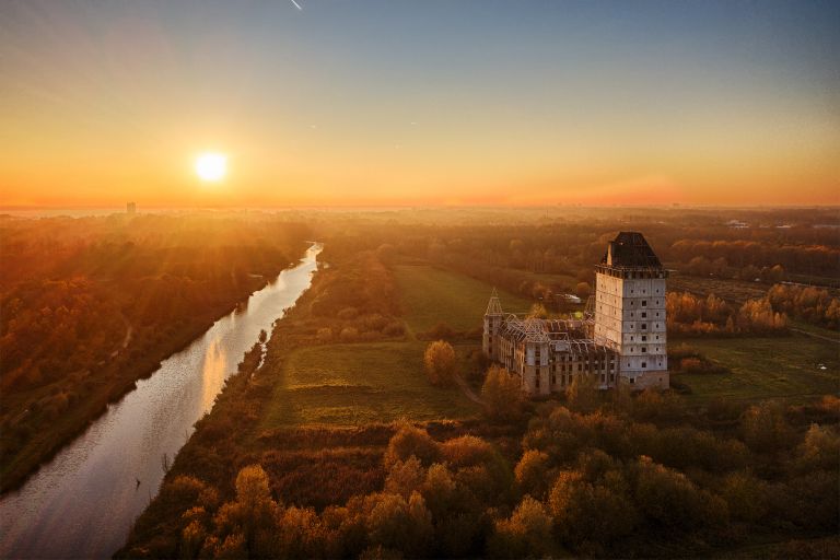 Orange sunset glow at Almere castle