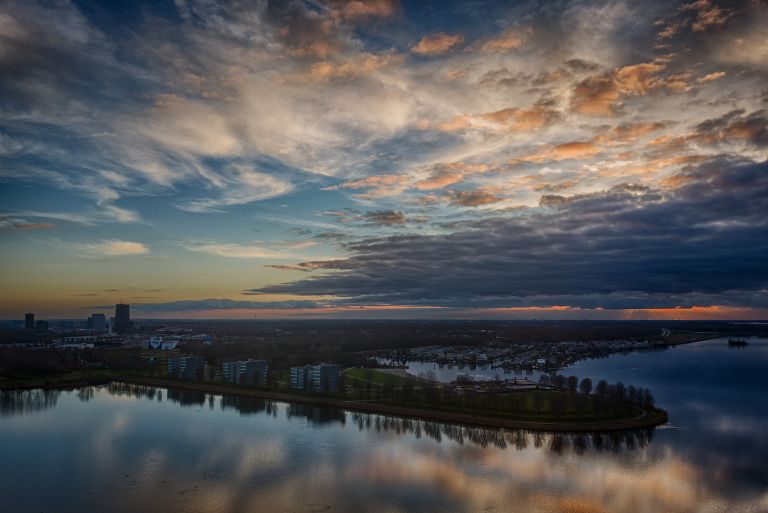 Cloudy sunset over lake Noorderplassen