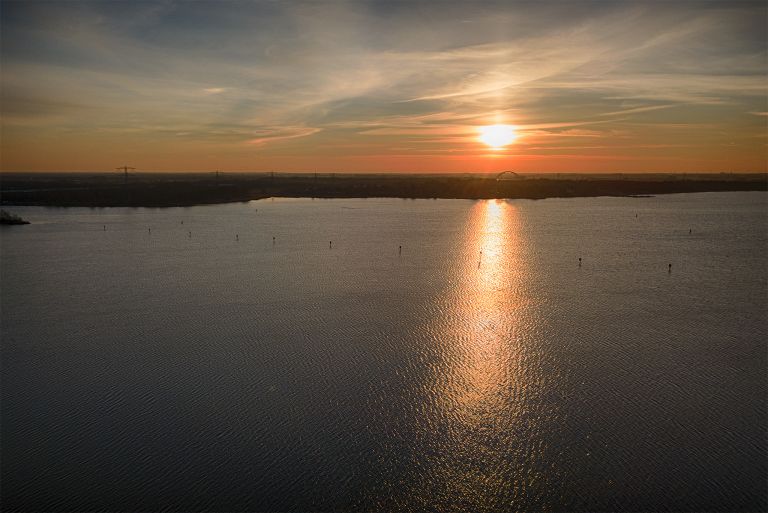 Sunset drone view over lake IJmeer