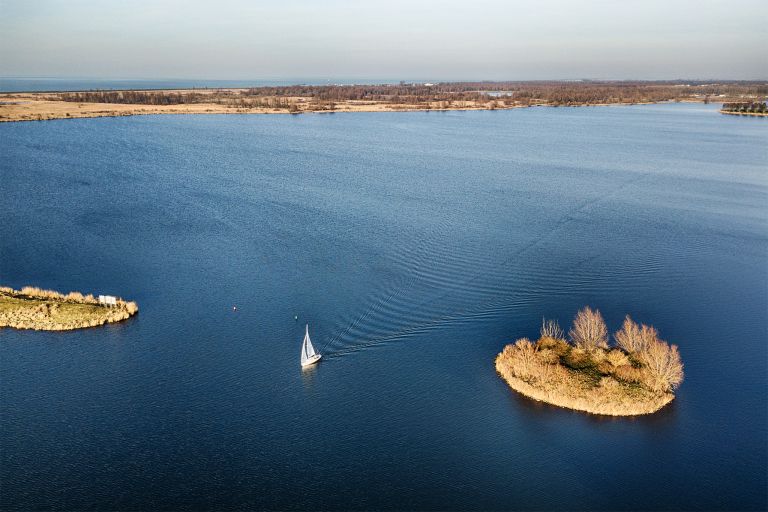 Sailing boat on lake Noorderplassen