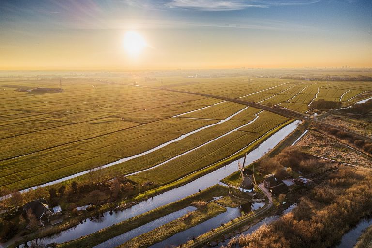 Typical Dutch landscape during sunset