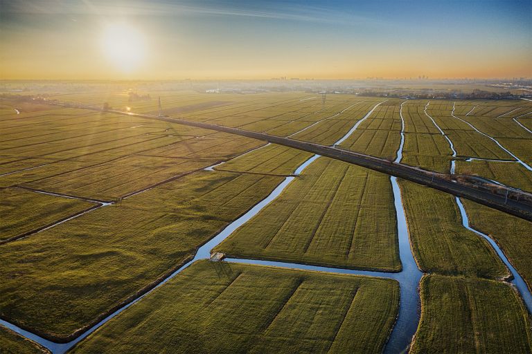 Flat fields around Weesp during sunset