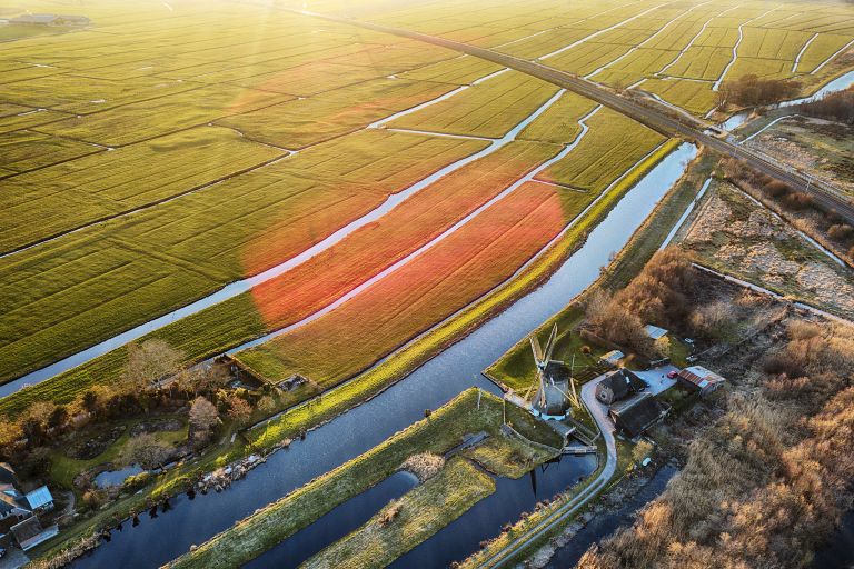 Drone sunset over the fields near Weesp