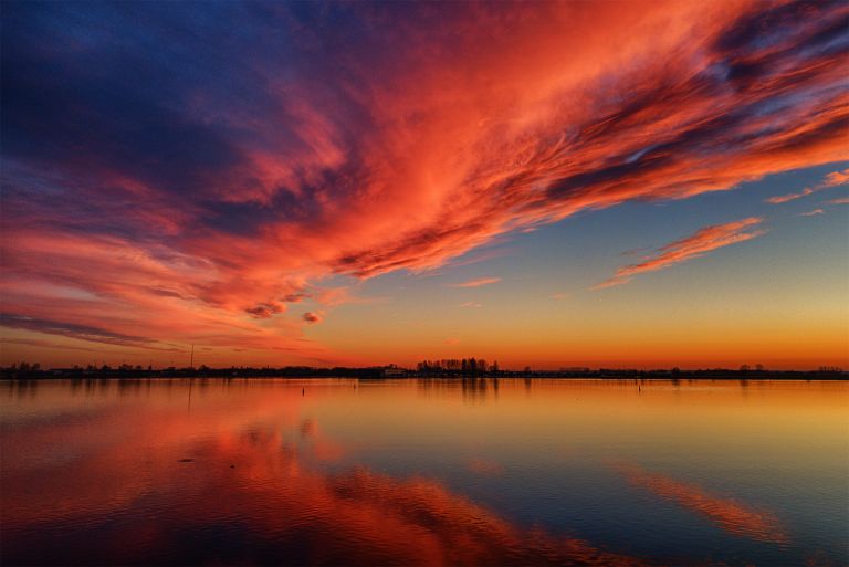 Drone picture of lake Eemmeer right after sunset