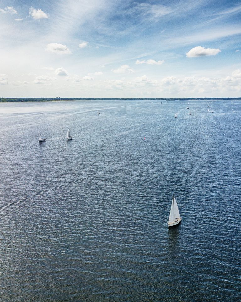 Sailing boats on lake Gooimeer