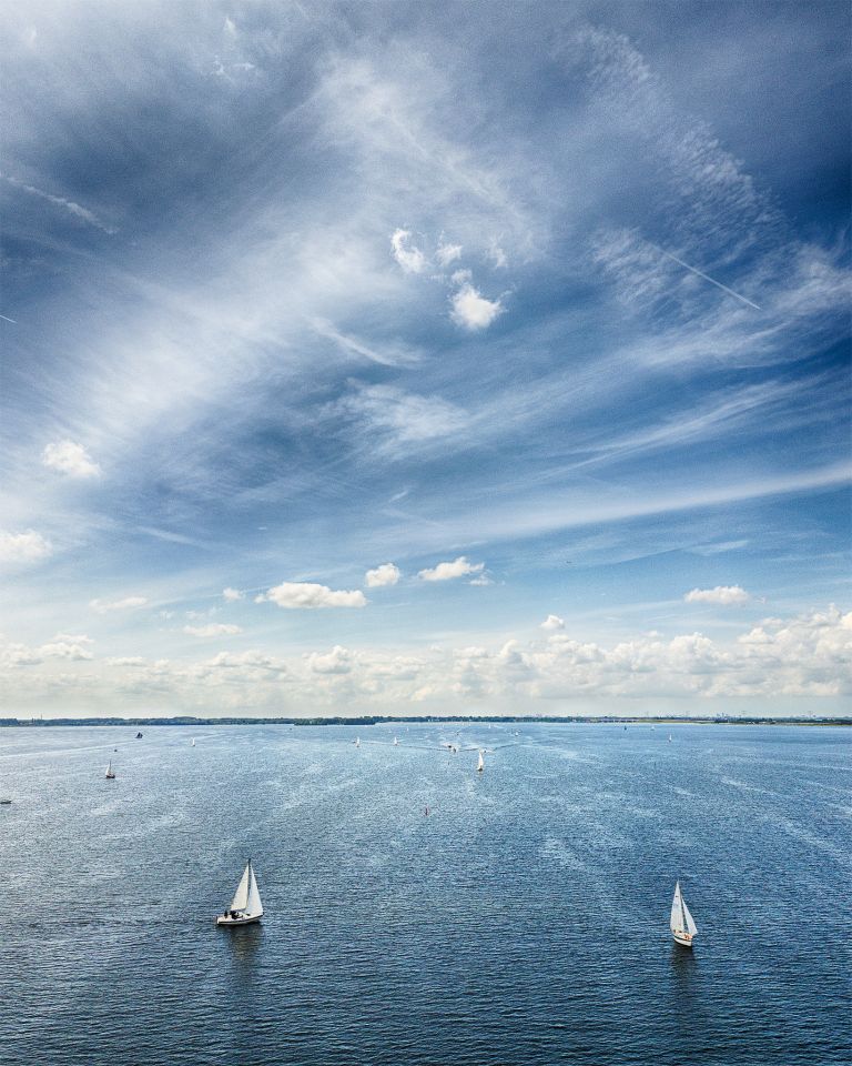 Sailing boats on lake Gooimeer