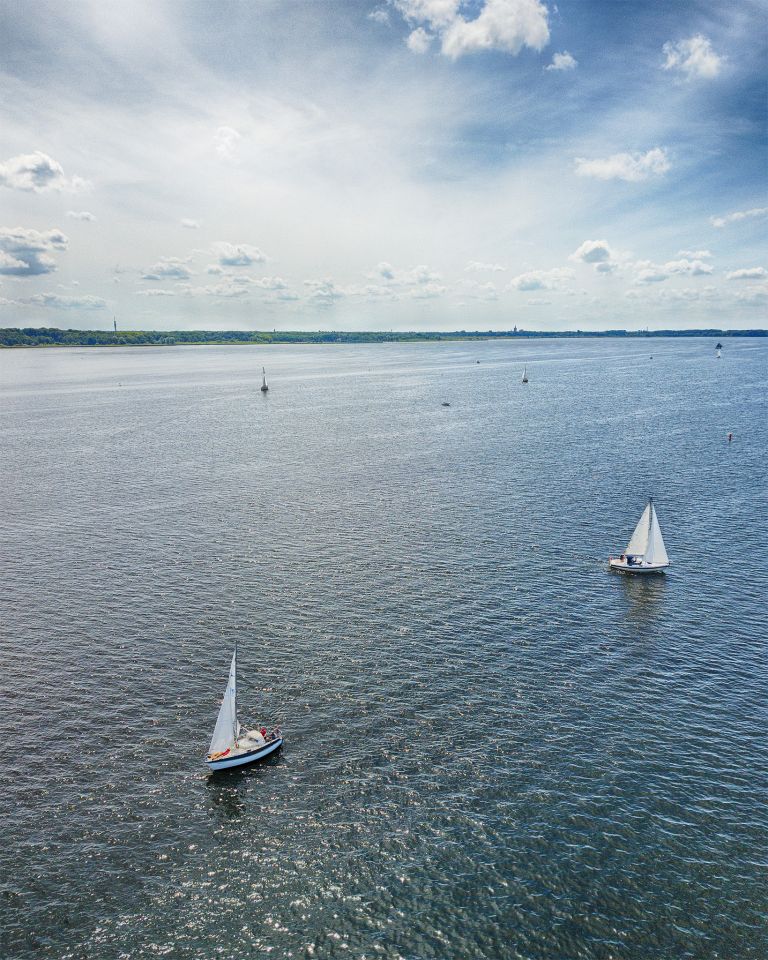 Sailing boats on lake Gooimeer